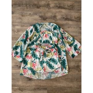 Set crop top, short pants, cover up.